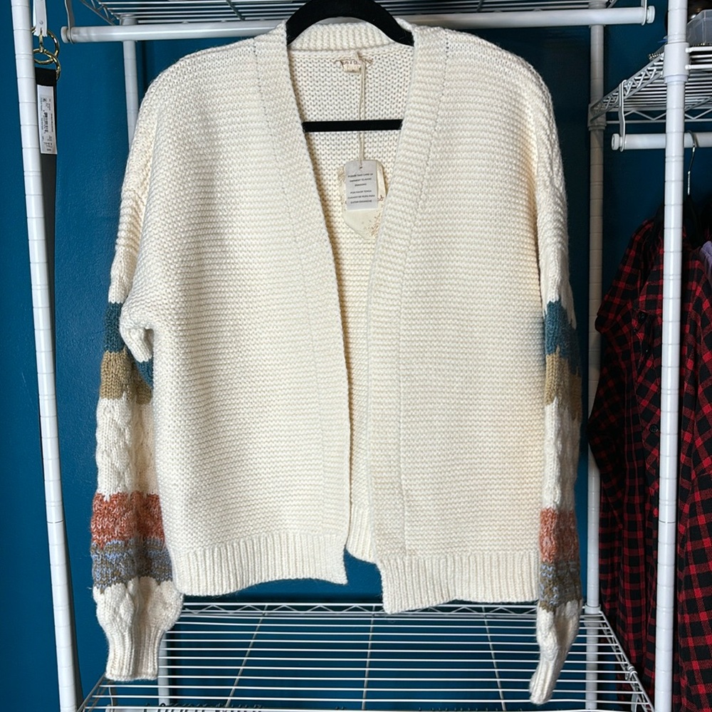 Hem and thread sweater